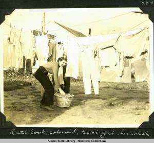 188. Ruth_Cook_colonist_taking_in_her_wash